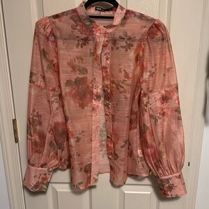 Floral blouse, puffy sleeves.